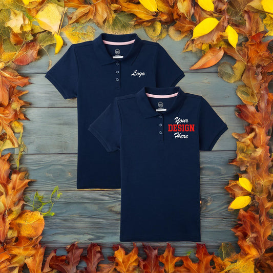 Multiple color options of custom embroidered polo shirts – available in red, navy, black, white.